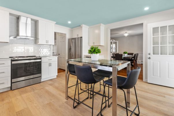 Dining room, Interior, Kitchen, Recessed Lighting, Stainless Steel Appliances, Wood Texture Flooring