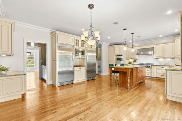 Chandelier, Interior, Kitchen, Pendant Lights, Recessed Lighting, Stainless Steel Appliances, Wood Texture Flooring