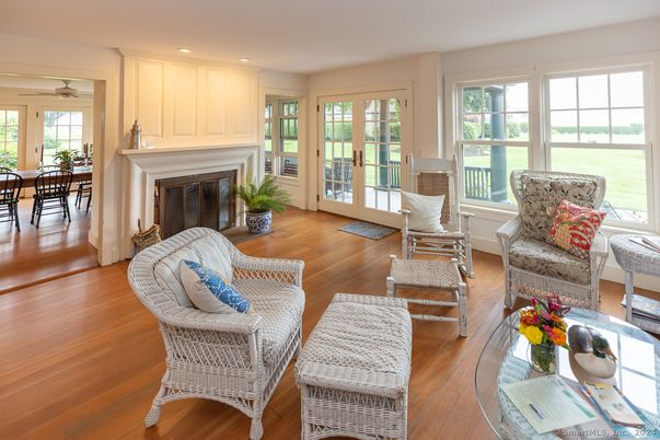Dining room, Fireplace, Interior, Living room, Recessed Lighting, Wood Texture Flooring