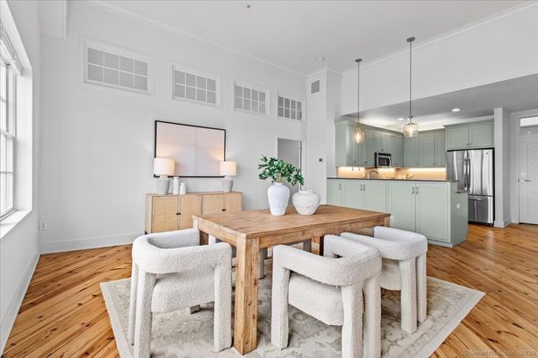 Dining room, Interior, Kitchen, Pendant Lights, Recessed Lighting, Stainless Steel Appliances, Wood Texture Flooring