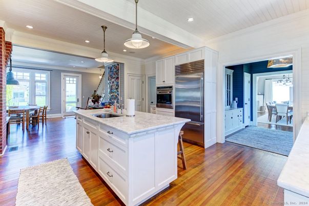 Dining room, Interior, Kitchen, Pendant Lights, Recessed Lighting, Stainless Steel Appliances, Wood Texture Flooring
