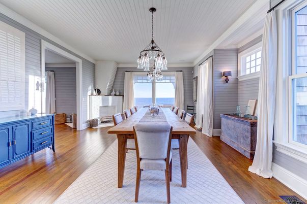 Dining room, Fireplace, Interior, Pendant Lights, Water, Wood Texture Flooring