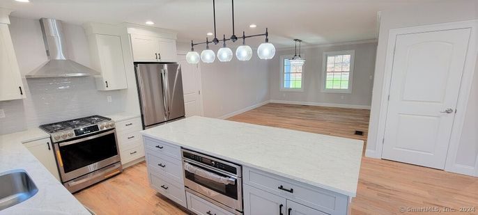 Interior, Kitchen, Pendant Lights, Recessed Lighting, Stainless Steel Appliances, Wood Texture Flooring