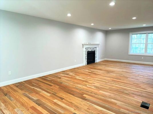 Empty room, Fireplace, Interior, Recessed Lighting, Wood Texture Flooring