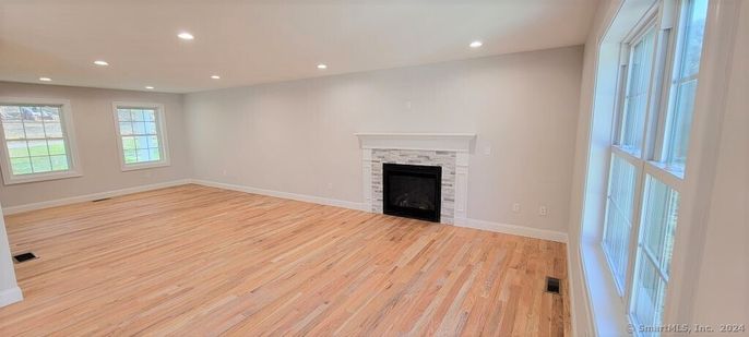 Empty room, Fireplace, Interior, Recessed Lighting, Wood Texture Flooring