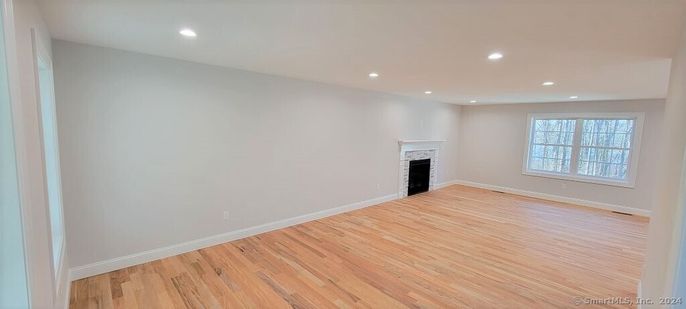 Empty room, Fireplace, Interior, Recessed Lighting, Wood Texture Flooring