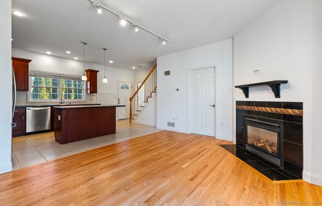 Fireplace, Interior, Kitchen, Pendant Lights, Recessed Lighting, Wood Texture Flooring