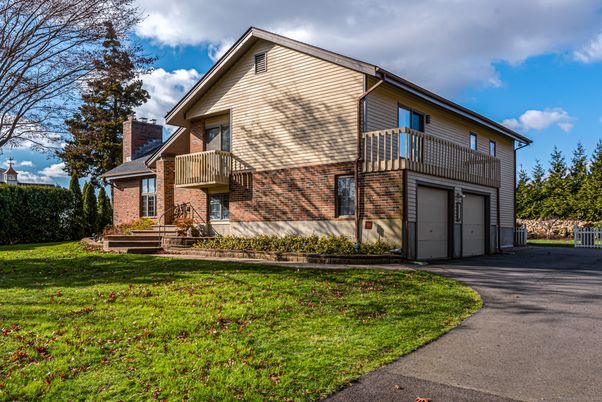 Attached, Exterior, Facade, Brick Facade, Tudor Revival