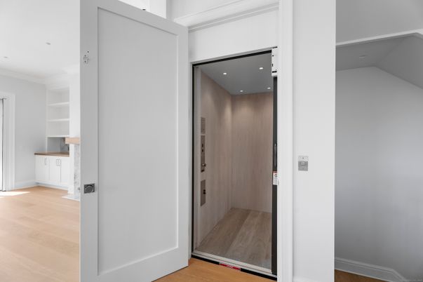 Elevator, Interior, Recessed Lighting, Wood Texture Flooring, Wooden Walls