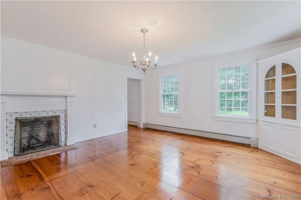 Chandelier, Empty room, Fireplace, Interior, Wood Texture Flooring