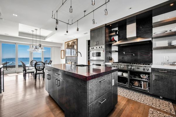 Dining room, Interior, Kitchen, Pendant Lights, Recessed Lighting, Stainless Steel Appliances, Water, Wood Texture Flooring