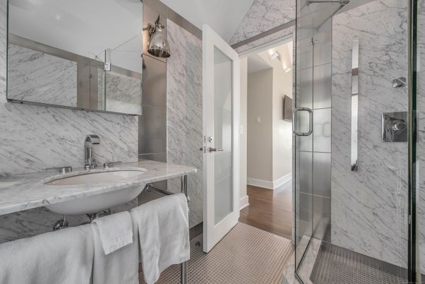Bathroom, Glass Shower, Interior, Marble Walls, Wood Texture Flooring