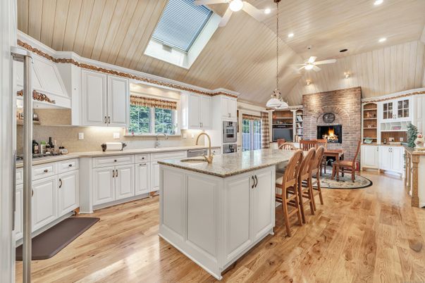 Dining room, Fireplace, Interior, Kitchen, Pendant Lights, Recessed Lighting, Stone Walls, Wood Texture Flooring