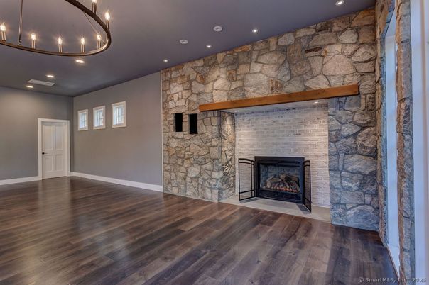 Fireplace, Interior, Recessed Lighting, Stone Walls, Wood Texture Flooring