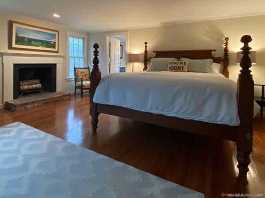 Bedroom, Fireplace, Interior, Recessed Lighting, Wood Texture Flooring