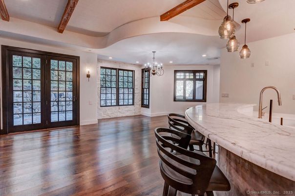 Chandelier, Dining room, Interior, Pendant Lights, Recessed Lighting, Wooden Beams, Wood Texture Flooring