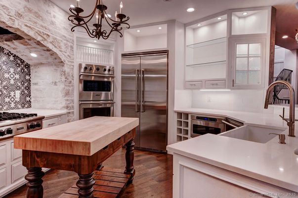 Chandelier, Interior, Kitchen, Recessed Lighting, Stainless Steel Appliances, Wood Texture Flooring