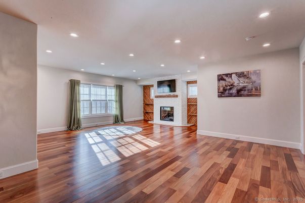 Empty room, Fireplace, Interior, Recessed Lighting, Wood Texture Flooring
