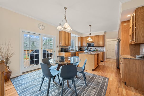 Dining room, Interior, Kitchen, Pendant Lights, Recessed Lighting, Stainless Steel Appliances, Wood Texture Flooring