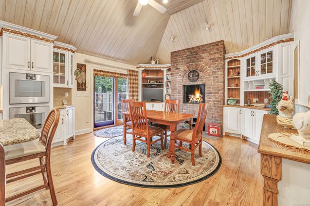 Dining room, Fireplace, Interior, Stone Walls, Wood Texture Flooring