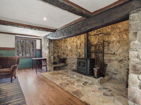 Fireplace, Interior, Recessed Lighting, Stone Walls, Wood Texture Flooring