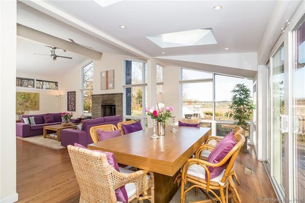 Dining room, Fireplace, Interior, Living room, Recessed Lighting, Wood Texture Flooring