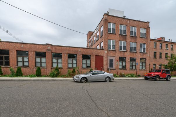 Exterior, Facade, Brick Facade, Condo Building