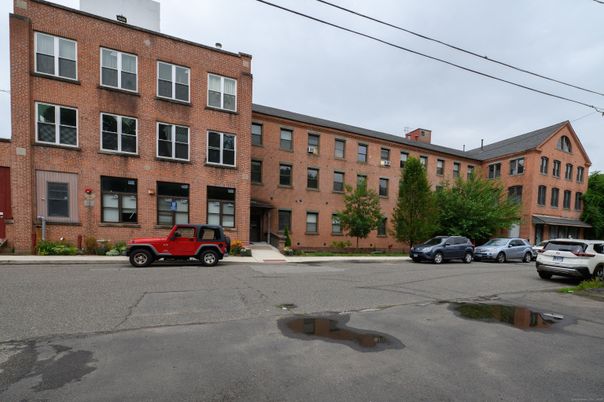 Exterior, Facade, Brick Facade, Condo Building