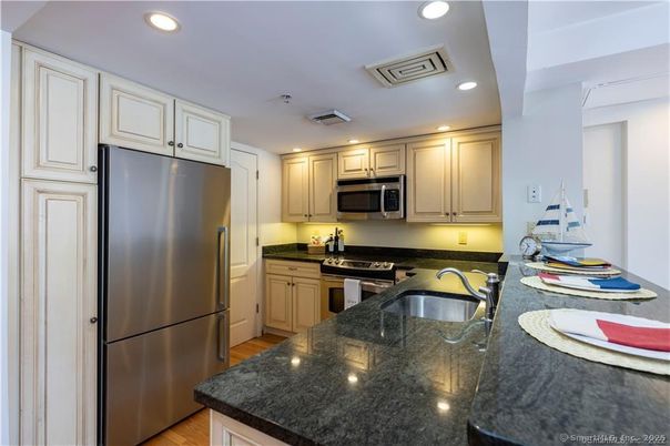 Interior, Kitchen, Recessed Lighting, Stainless Steel Appliances, Wood Texture Flooring