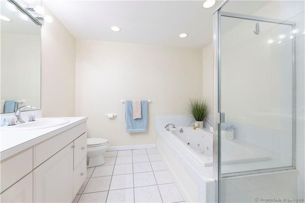 Bathroom, Dual Sink Vanities, Glass Shower, Interior, Marble, Recessed Lighting
