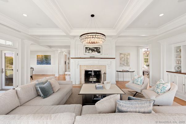 Chandelier, Fireplace, Interior, Living room, Recessed Lighting, Wood Texture Flooring