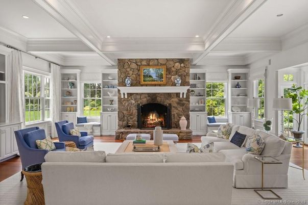 Fireplace, Interior, Living room, Recessed Lighting, Stone Walls, Wood Texture Flooring