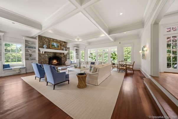 Dining room, Fireplace, Interior, Living room, Recessed Lighting, Wood Texture Flooring