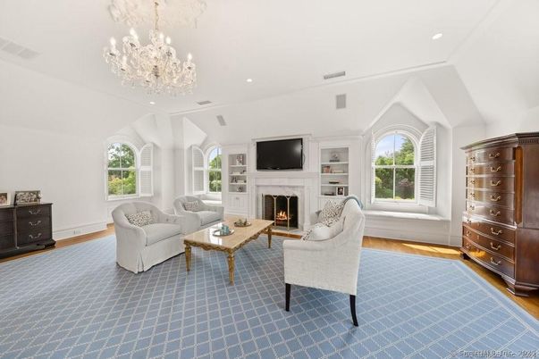 Chandelier, Fireplace, Interior, Living room, Recessed Lighting, Wood Texture Flooring