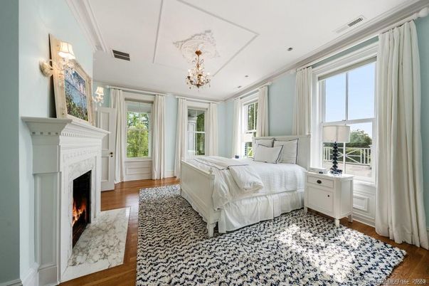 Bedroom, Chandelier, Fireplace, Interior, Wood Texture Flooring