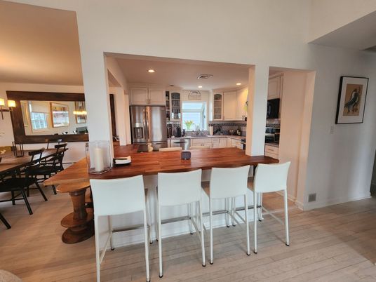 Dining room, Interior, Kitchen, Pendant Lights, Recessed Lighting, Stainless Steel Appliances, Wood Texture Flooring