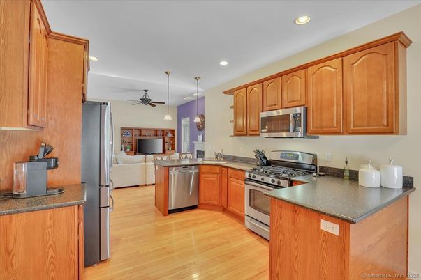 Dining room, Interior, Kitchen, Pendant Lights, Recessed Lighting, Stainless Steel Appliances, Wood Texture Flooring
