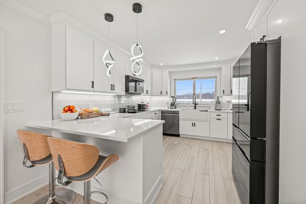 Interior, Kitchen, Pendant Lights, Recessed Lighting, Stainless Steel Appliances, Wood Texture Flooring