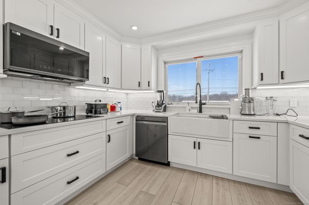Interior, Kitchen, Recessed Lighting, Stainless Steel Appliances, Wood Texture Flooring