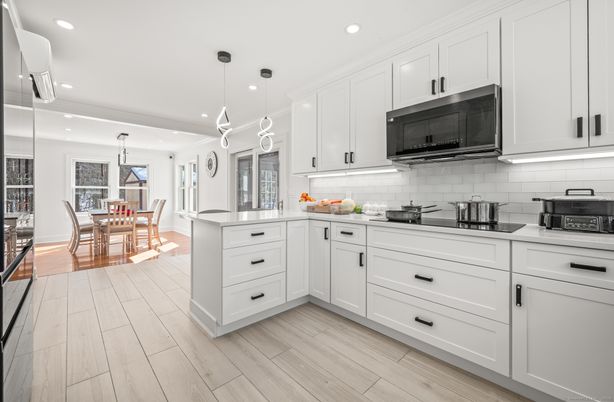Dining room, Interior, Kitchen, Pendant Lights, Recessed Lighting, Stainless Steel Appliances, Wood Texture Flooring