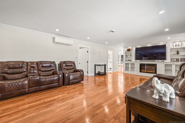 Fireplace, Interior, Living room, Recessed Lighting, Wood Texture Flooring