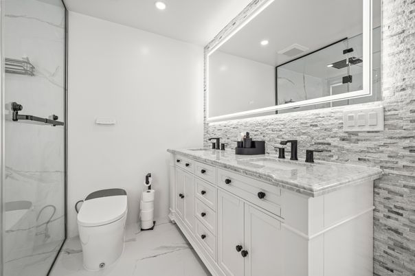 Bathroom, Dual Sink Vanities, Interior, Marble, Marble Walls, Recessed Lighting, Tile Countertops