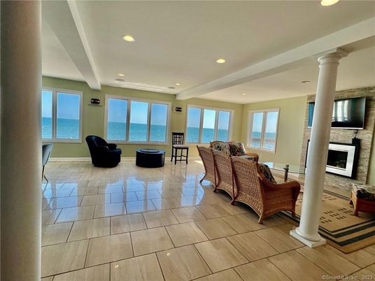 Fireplace, Interior, Living room, Recessed Lighting, Stone Walls, Water