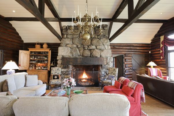 Chandelier, Fireplace, Interior, Living room, Recessed Lighting, Stone Walls, Wooden Beams, Wood Texture Flooring, Wooden Walls