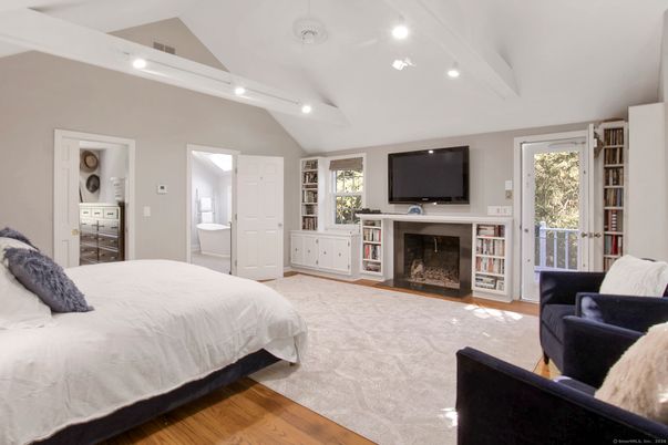 Bedroom, Fireplace, Interior, Recessed Lighting, Wood Texture Flooring