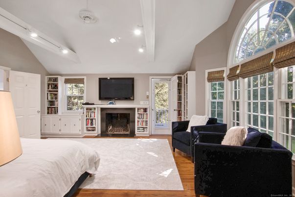 Bedroom, Fireplace, Interior, Recessed Lighting, Wood Texture Flooring