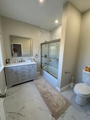 Bathroom, Dual Sink Vanities, Glass Shower, Interior, Marble, Marble Walls, Recessed Lighting