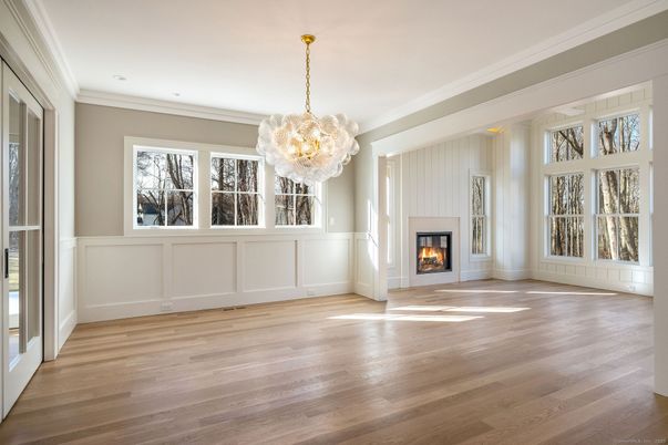 Chandelier, Empty room, Fireplace, Interior, Recessed Lighting, Wood Texture Flooring