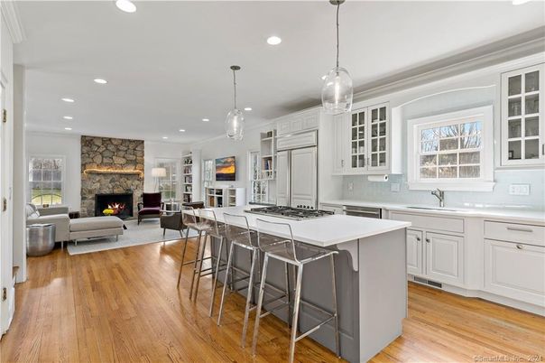 Fireplace, Interior, Kitchen, Living room, Pendant Lights, Recessed Lighting, Stone Walls, Wood Texture Flooring