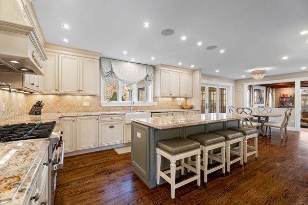 Dining room, Interior, Kitchen, Recessed Lighting, Stainless Steel Appliances, Wood Texture Flooring